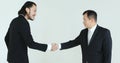 Asian businessmen talking together and handshake.
