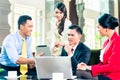 Asian businesspeople having meeting Royalty Free Stock Photo