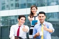 Asian businesspeople working outside with coffee Royalty Free Stock Photo