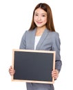 Asian businessswoman show with black board