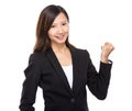 Asian businesswoman arm clench