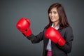 Asian businesswoman with boxing glove Royalty Free Stock Photo