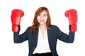Asian businesswoman with boxing glove show her fists Royalty Free Stock Photo