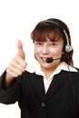 Asian businesswoman of call center with head sets