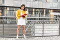 Asian Businesswoman in casual wear writing on clipboard. Portrait Of Successful Business Woman Holding clipboard. Photo business Royalty Free Stock Photo