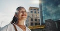 Asian businesswoman, city and smile by office buildings in morning, view and travel to workplace in accounting career Royalty Free Stock Photo