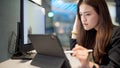 Asian businesswoman feeling stressed working in office