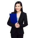 Asian businesswoman with file pad Royalty Free Stock Photo