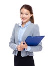 Asian businesswoman with filepad Royalty Free Stock Photo