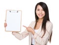 Asian businesswoman with finger point to clipboard Royalty Free Stock Photo