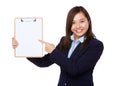 Asian businesswoman finger point to clipboard Royalty Free Stock Photo