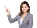 Asian businesswoman with finger point upwards Royalty Free Stock Photo