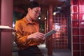 Asian Businesswoman in Futuristic Interior