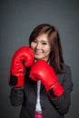 Asian businesswoman guard with boxing glove Royalty Free Stock Photo