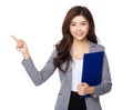 Asian businesswoman hold with clipboard and finger point up Royalty Free Stock Photo