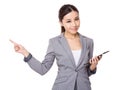 Asian businesswoman hold a tablet pc and finger point up Royalty Free Stock Photo