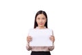 Asian businesswoman holding blank white placard board paper sign with empty copy space on white background with clipping Royalty Free Stock Photo