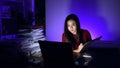 Asian businesswoman online working hard late hours with laptop at home. Busy and exhausted of work at night Royalty Free Stock Photo