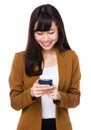 Asian businesswoman read the message on cellphone Royalty Free Stock Photo