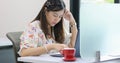 Asian businesswoman serious about the work and using notebook for business partners discussing documents and ideas at meeting Royalty Free Stock Photo