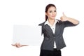 Asian businesswoman show a blank sign and thumbs-u Royalty Free Stock Photo