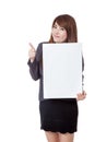 Asian businesswoman thumbs-up with a vertical blank sign Royalty Free Stock Photo