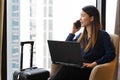 Asian businesswoman using laptop working in hotel room Royalty Free Stock Photo