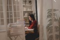 Asian businesswoman working hard late hours with a lot of document at home. Busy and exhausted of work at night Royalty Free Stock Photo