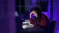 Asian businesswoman working hard late hours with a lot of document at home. Busy and exhausted of work overtime Royalty Free Stock Photo