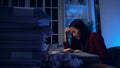 Asian businesswoman working hard late hours with a lot of document at home. Busy and exhausted of workat night Royalty Free Stock Photo