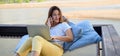 Asian businesswoman working online at the beach. Freelancer using technology for work everywhere. Woman talking with customer Royalty Free Stock Photo