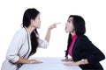 Asian businesswomen fighting Royalty Free Stock Photo