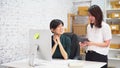 Asian businesswomen using tablet in office