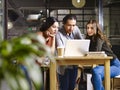 Asian and caucasian businesspeople meeting in office