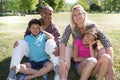 Asian Caucasian mixed race family in portrait at park Royalty Free Stock Photo