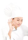 Asian chef baker or cook showing ok hand sign Royalty Free Stock Photo