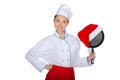 Asian chef and a frying pan in Santa hat