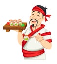 Asian chef holding sushi. Handsome Japanese cook Royalty Free Stock Photo