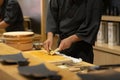 Asian Chef preparing raw wasabi, Omakase style Japanese traditio Royalty Free Stock Photo