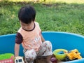 Asian child boy smiling with happy face outdoor. Royalty Free Stock Photo