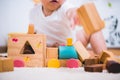 Asian child building playing toy blocks wood Royalty Free Stock Photo