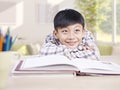 Asian child daydreaming Royalty Free Stock Photo