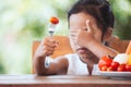 Asian child does not like to eat vegetables Royalty Free Stock Photo