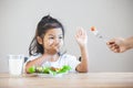 Child does not like to eat vegetables and refuse to eat healthy vegetables Royalty Free Stock Photo