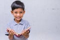 Asian Child Feel Happy with a Book.