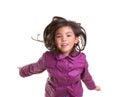 Asian child girl jumping happy with winter purple coat Royalty Free Stock Photo