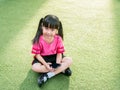 Asian child girl play smart phone Royalty Free Stock Photo