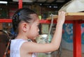 Asian child girl talking on the retro telephone Royalty Free Stock Photo