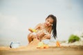 Asian Child Happy Play On The Beach Royalty Free Stock Photo