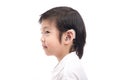 Asian child with hearing aid